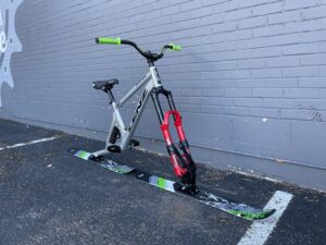 Lenz Ski bike in front of gray brick wall at Bicycle Experience Colorado Springs