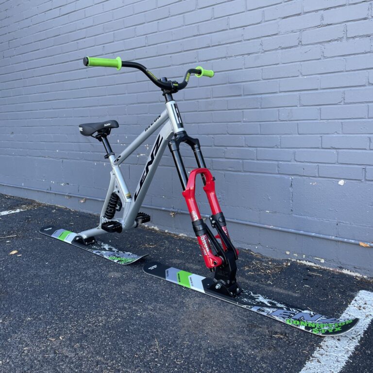 Lenz Ski bike in front of gray brick wall at Bicycle Experience Colorado Springs